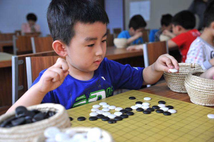 小朋友围棋学多久可以考段，孩子学围棋一般达到业余几段?