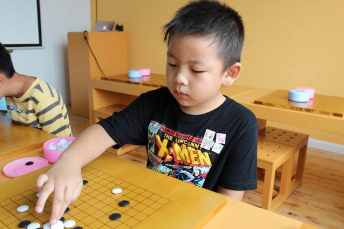 小孩学多久围棋考段，孩子学围棋多久可以达到一段